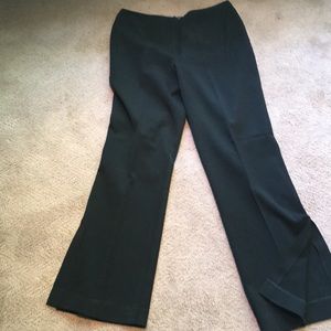 Black slacks with a side slit.